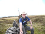 IOB at the summit cairn, picture courtesy of 'Stickpic' camera adapter. 